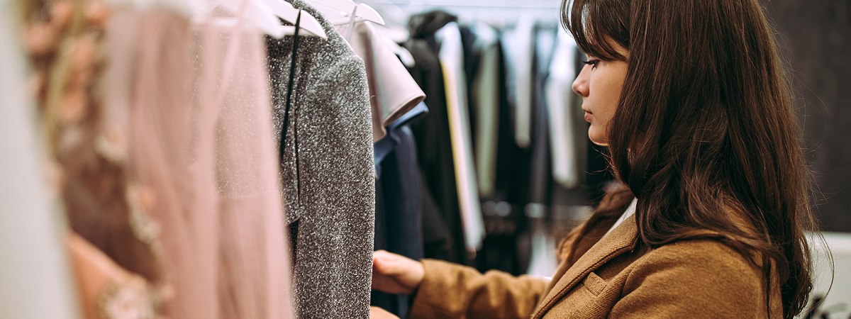 Retail Sector Hero Image featuring a woman shopping at a retail store